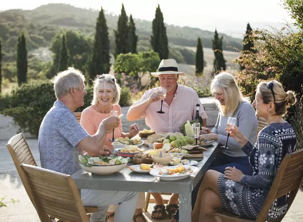 friends eating Italian food in Italy