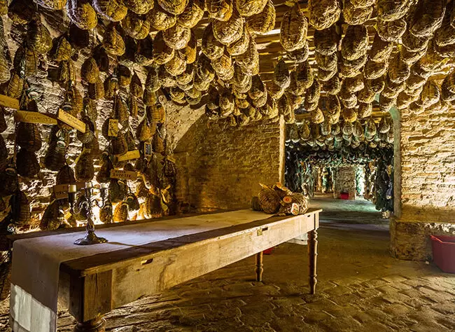 making of prosciutto salted pork in Parma