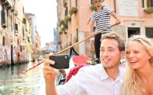 tourists taking photos in Venice