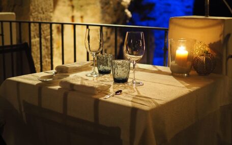 champagne glasses candle light dinner